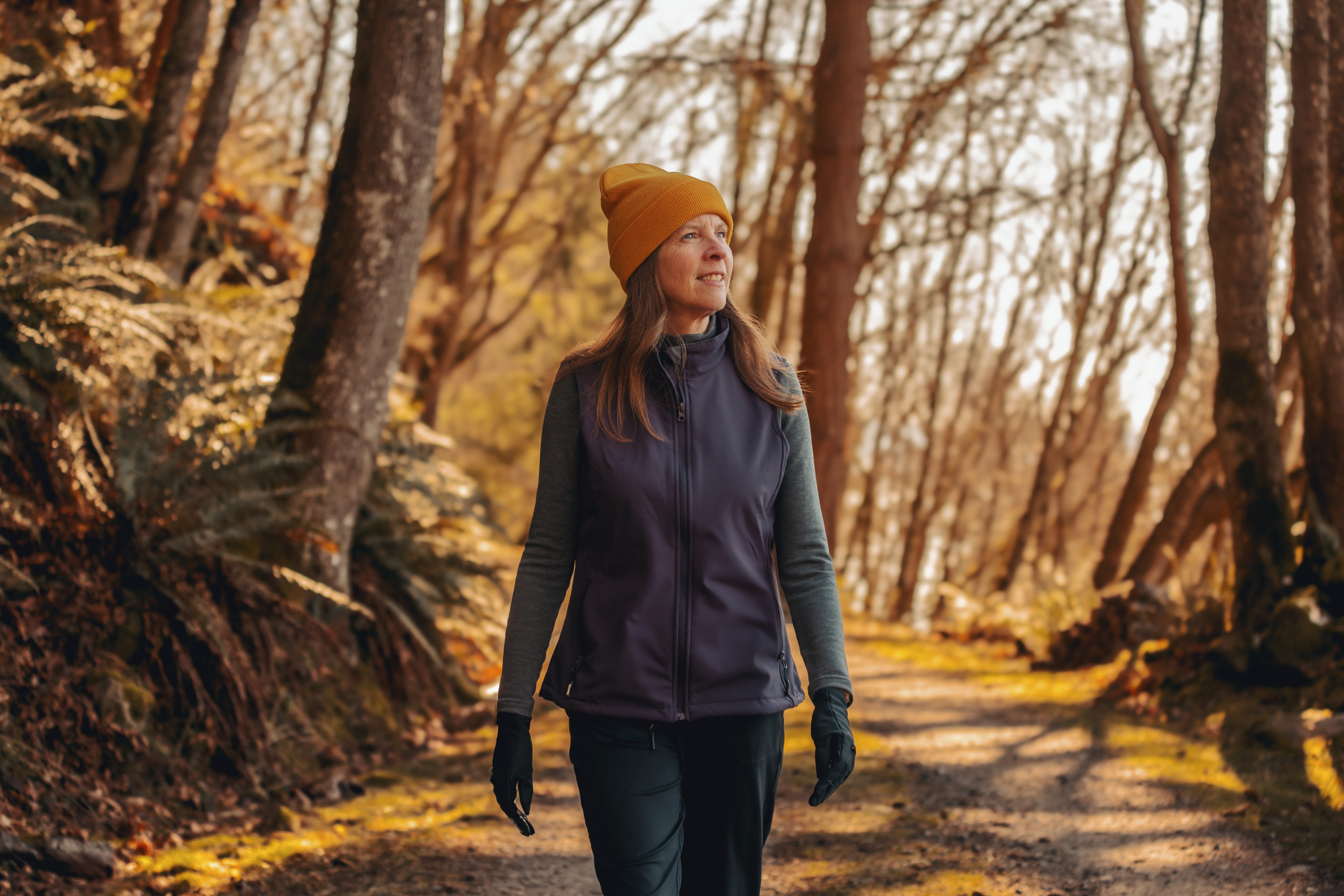 Image showing FCS patient and paid speaker for Ionis, Genevie, walking on a path outside
